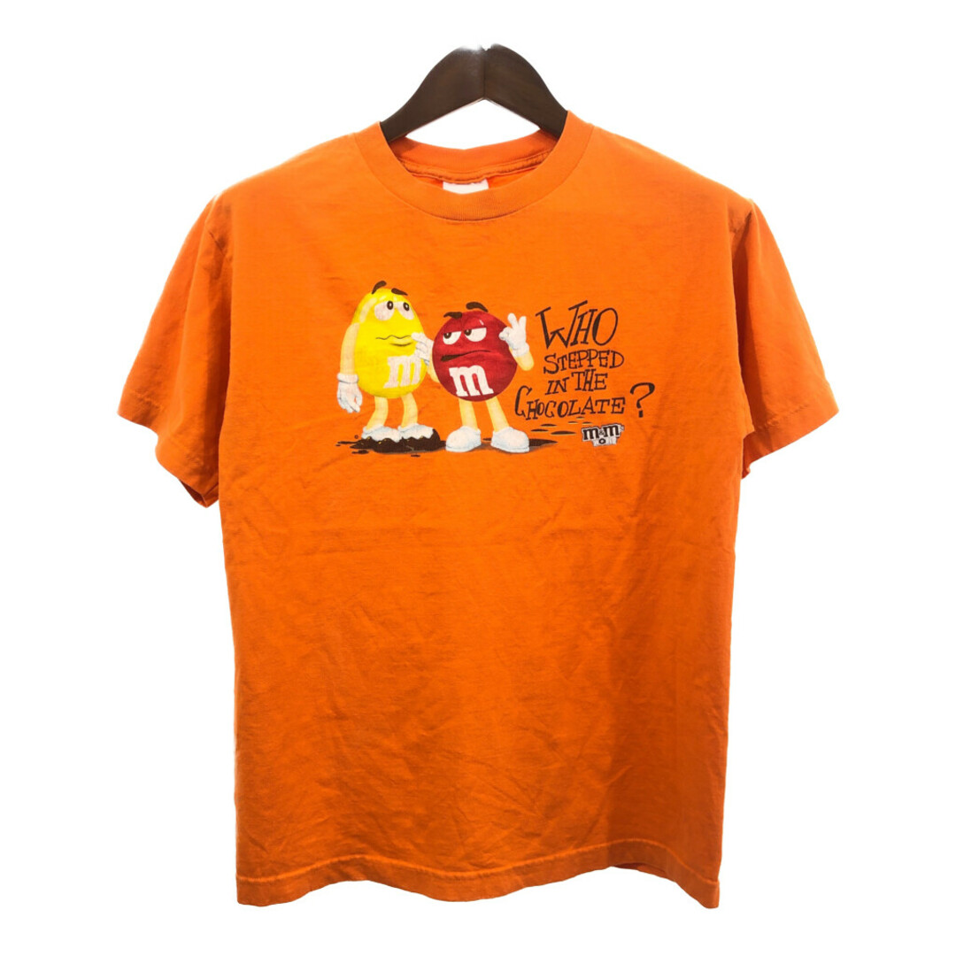 M&M'S WORLD エムアンドエムズ 半袖Ｔシャツ キャラクター オレンジ (メンズ MEDIUM) 中古 古着 Q6415 メンズのトップス(Tシャツ/カットソー(半袖/袖なし))の商品写真