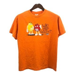 M&M'S WORLD エムアンドエムズ 半袖Ｔシャツ キャラクター オレンジ (メンズ MEDIUM) 中古 古着 Q6415(Tシャツ/カットソー(半袖/袖なし))