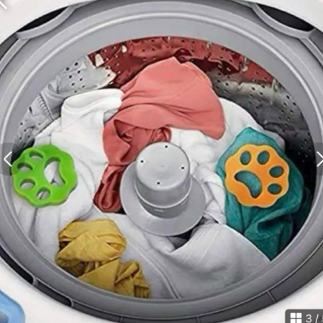 匿名発送！洗濯機のベッドの毛除去剤　シリコン　グリーン　オレンジ　3個 インテリア/住まい/日用品の日用品/生活雑貨/旅行(日用品/生活雑貨)の商品写真