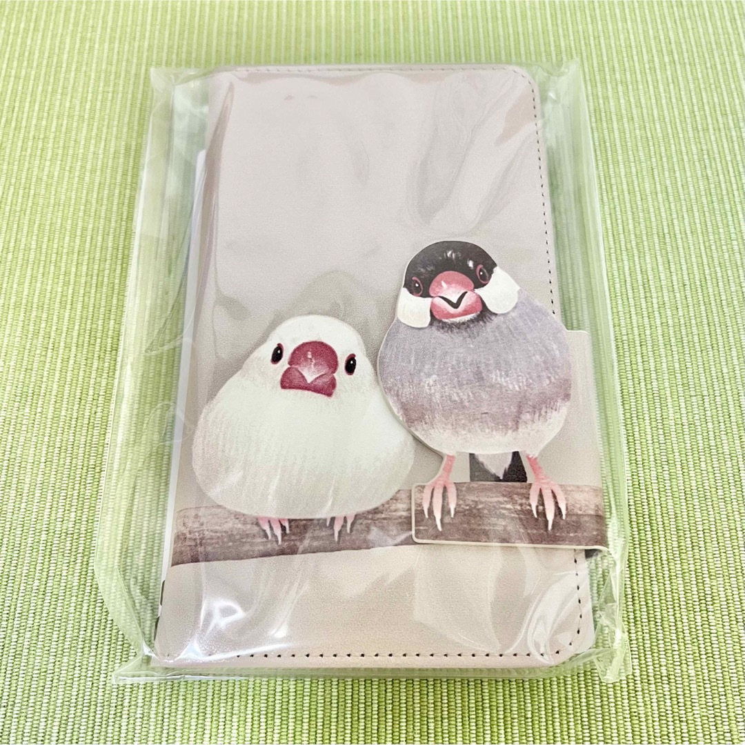 FELISSIMO(フェリシモ)の❤︎【新品未開封】フェリシモ★スマホカバー 文鳥 エンタメ/ホビーのおもちゃ/ぬいぐるみ(キャラクターグッズ)の商品写真