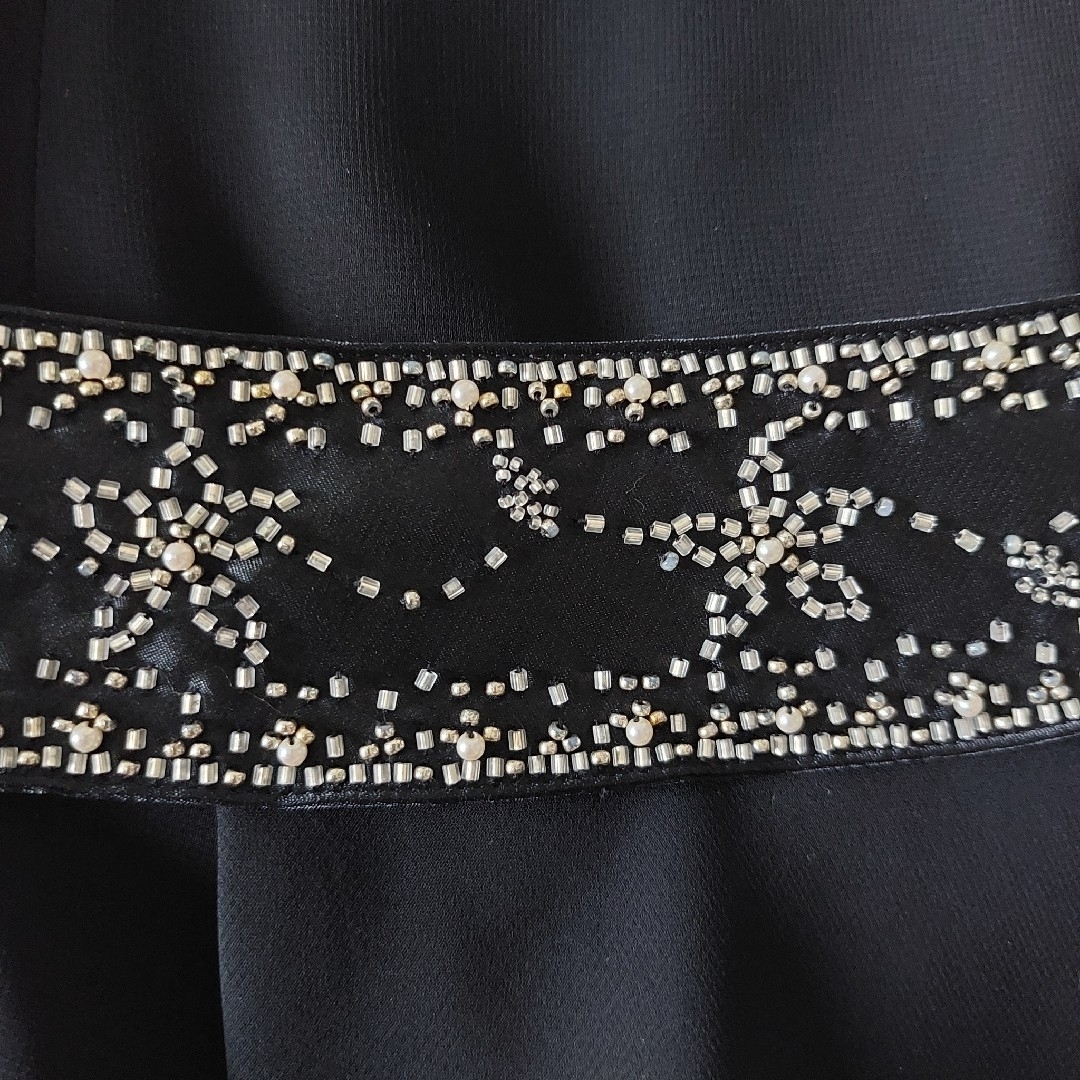 MK MICHEL KLEIN(エムケーミッシェルクラン)の黒ドレス　結婚式　パーティー　膝丈　アシンメトリー　中古品 レディースのフォーマル/ドレス(ミディアムドレス)の商品写真