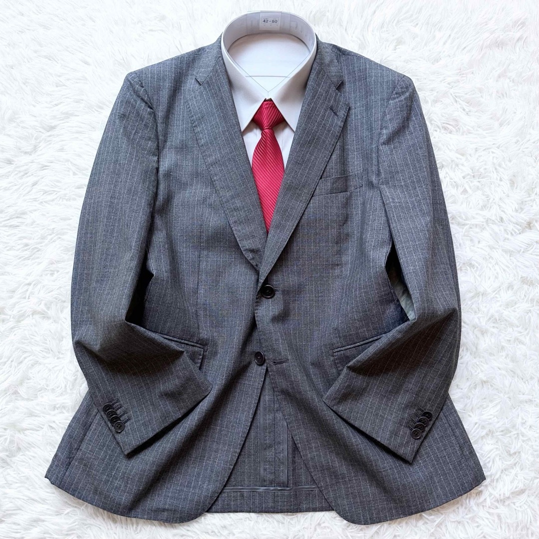 THE SUIT COMPANY(スーツカンパニー)のザスーツカンパニー シングルスーツ ビジネススーツ カノニコ グレー ウール L メンズのスーツ(セットアップ)の商品写真