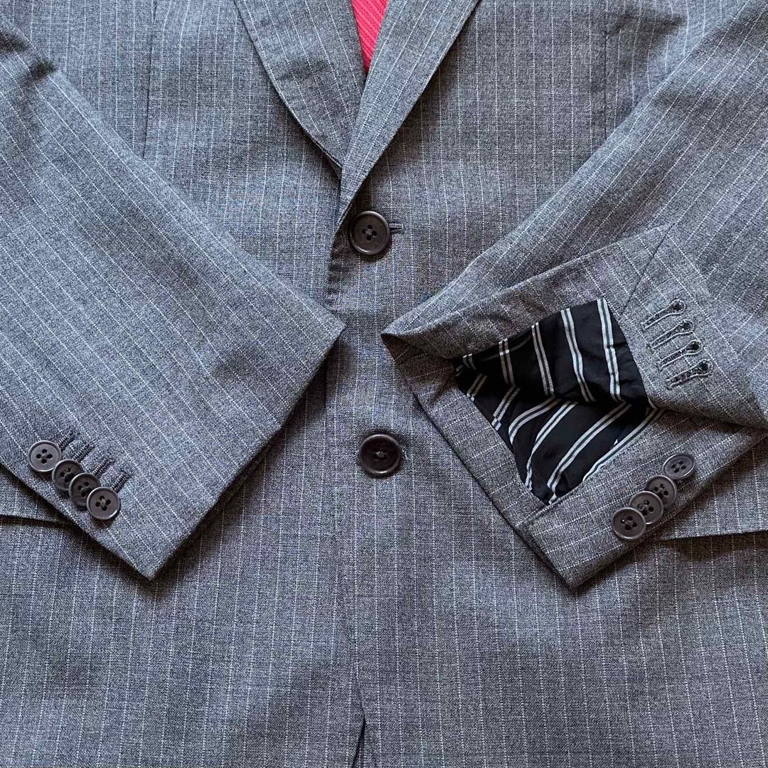 THE SUIT COMPANY(スーツカンパニー)のザスーツカンパニー シングルスーツ ビジネススーツ カノニコ グレー ウール L メンズのスーツ(セットアップ)の商品写真