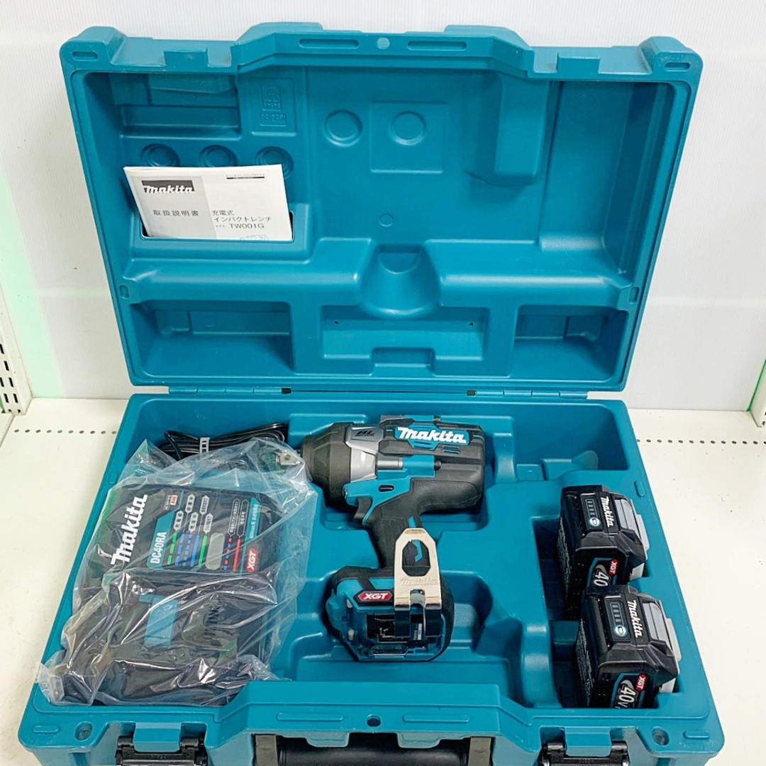 Makita(マキタ)の♭♭MAKITA マキタ 充電式インパクトレンチ　40Ｖ　充電器・充電池2個（充電回数1回ずつ）・ケース付 TW001G ブルー インテリア/住まい/日用品のインテリア/住まい/日用品 その他(その他)の商品写真