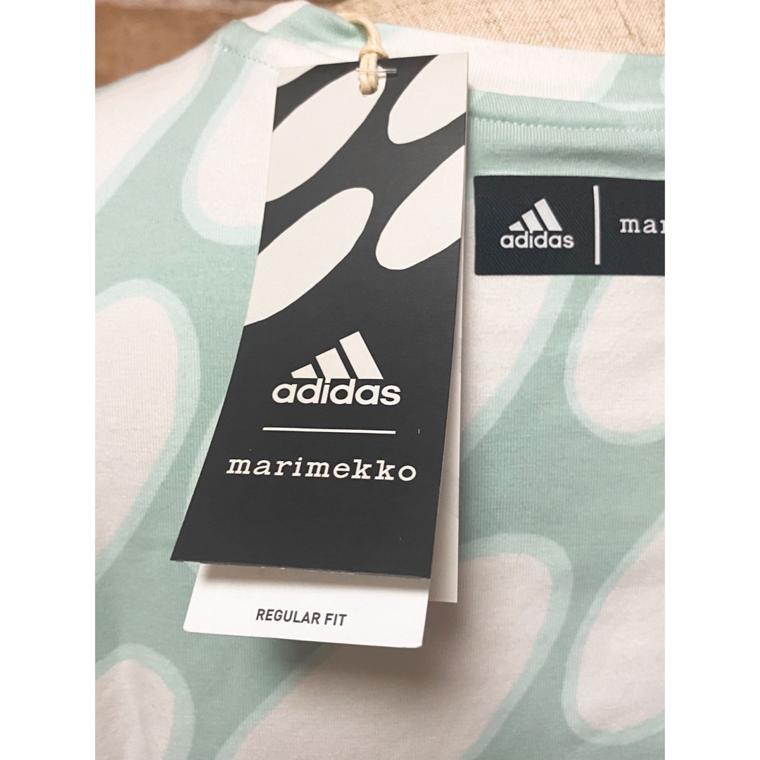 adidas(アディダス)の新品 訳あり adidas マリメッコ   ミントカラー 半袖Tシャツ  160 キッズ/ベビー/マタニティのキッズ服女の子用(90cm~)(Tシャツ/カットソー)の商品写真