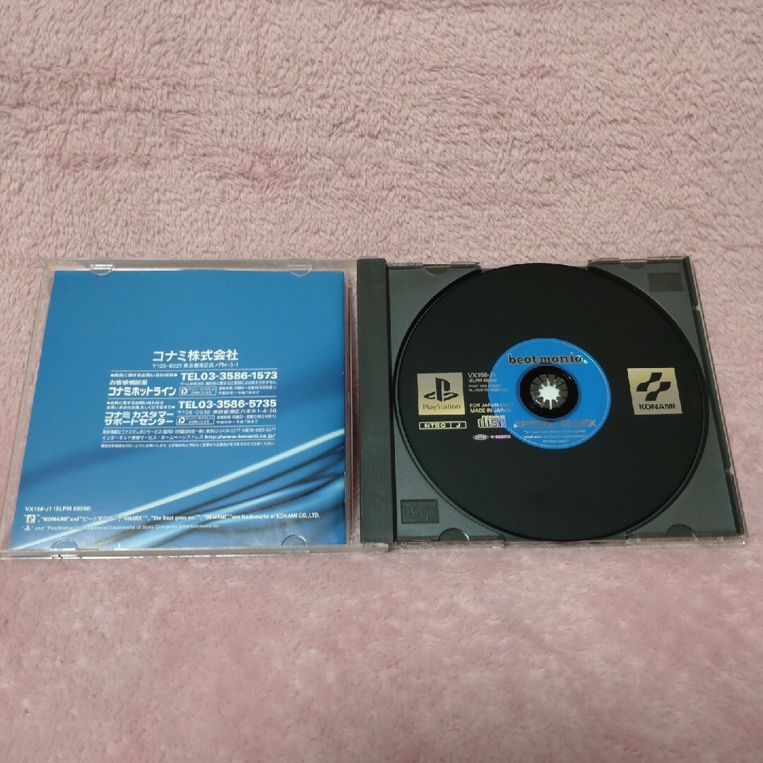 PlayStation2(プレイステーション2)の「ビートマニアII DX 6th style」「ビートマニア」とコントローラ２台 エンタメ/ホビーのゲームソフト/ゲーム機本体(家庭用ゲームソフト)の商品写真