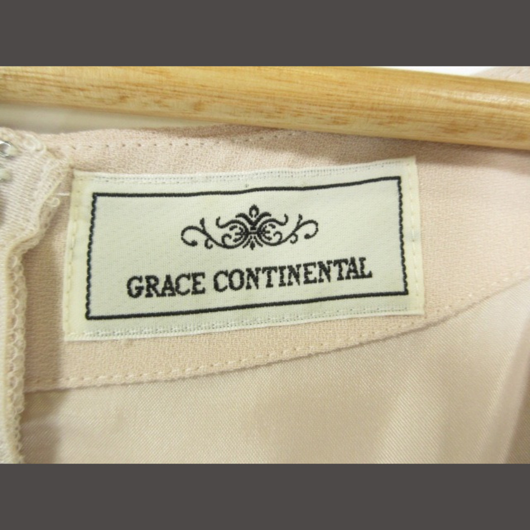 GRACE CONTINENTAL(グレースコンチネンタル)のグレースコンチネンタル ワンピース 七分袖 ひざ丈 ビジュー アイボリー 黒   レディースのワンピース(ひざ丈ワンピース)の商品写真