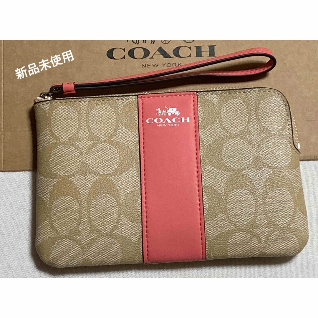 COACH(コーチ)の新品　COACH コーチ　ポーチ　シグネチャー　 レディースのファッション小物(ポーチ)の商品写真