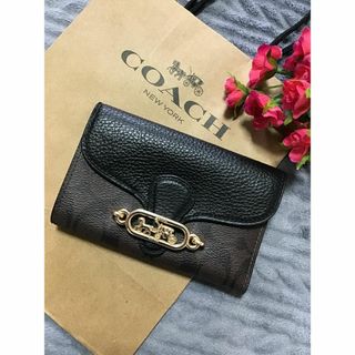 COACH - 新品　ショッパー付　COACH シグネチャー 柄　折財布