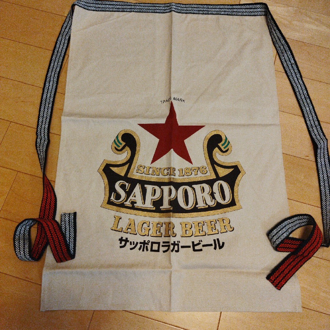 サッポロ(サッポロ)のSAPPORO 赤星 前掛け エンタメ/ホビーのコレクション(ノベルティグッズ)の商品写真