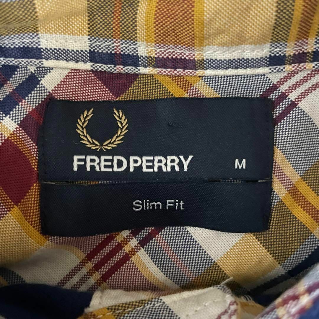 FRED PERRY(フレッドペリー)の[古着]フレッドペリー　半袖　BDポロシャツ　ワンポイント刺繍　チェック　青 メンズのトップス(ポロシャツ)の商品写真