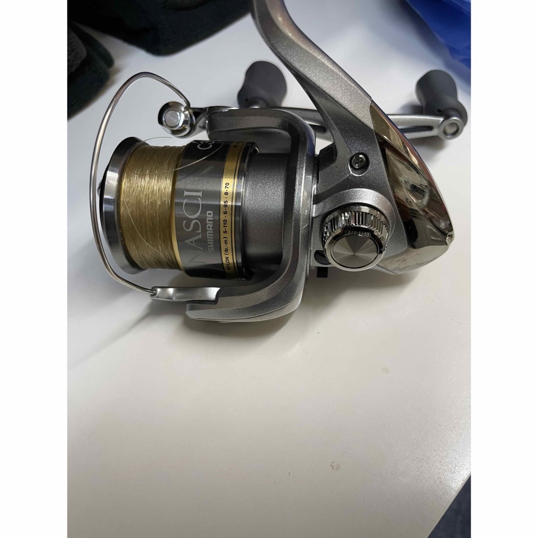 SHIMANO(シマノ)の一回使用シマノ SHIMANO nasci c3000 sdh スピニングリール スポーツ/アウトドアのフィッシング(リール)の商品写真