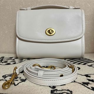 コーチ(COACH)のコーチ　coach キップ ターンロック クロスボディ　ブラス　チョーク　白(ショルダーバッグ)