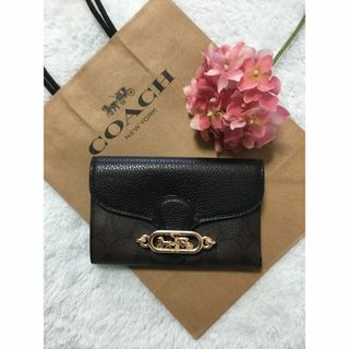 COACH - 新品　ショッパー付　COACH シグネチャー柄　折り財布