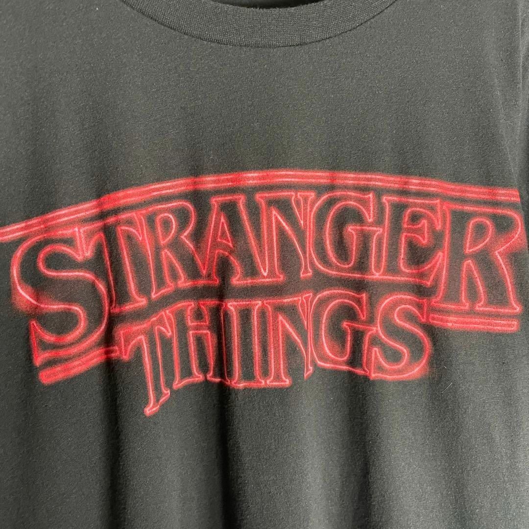 VINTAGE(ヴィンテージ)の[古着]ストレンジャーシングス　半袖　Tシャツ　ムービー　未知の世界　プリント メンズのトップス(Tシャツ/カットソー(半袖/袖なし))の商品写真