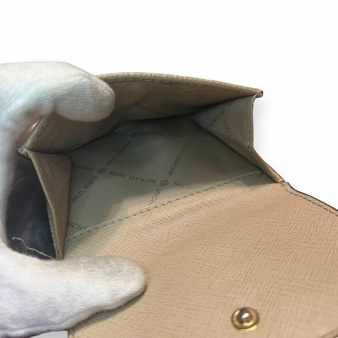 Michael Kors(マイケルコース)のMICHAEL KORS マイケルコース　三つ折り財布　スタッズ　レザー レディースのファッション小物(財布)の商品写真