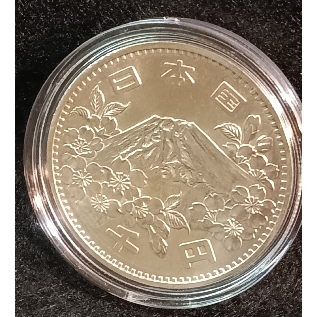 銀貨　東京オリンピック1.000円銀貨　silver925カプセルホルダー　綺麗 エンタメ/ホビーの美術品/アンティーク(金属工芸)の商品写真