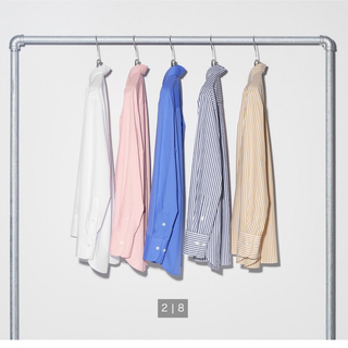 ユニクロ(UNIQLO)の新品　コットンシャツ、綺麗色、青(シャツ/ブラウス(長袖/七分))