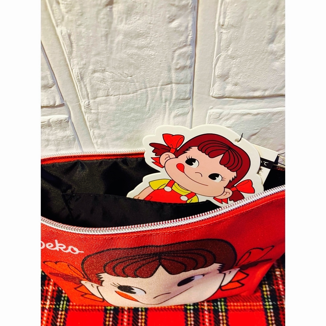 サンリオ(サンリオ)のペコちゃん白いミニトートバッグ&ペコちゃん真っ赤なポーチセット☆未使用品 レディースのバッグ(トートバッグ)の商品写真