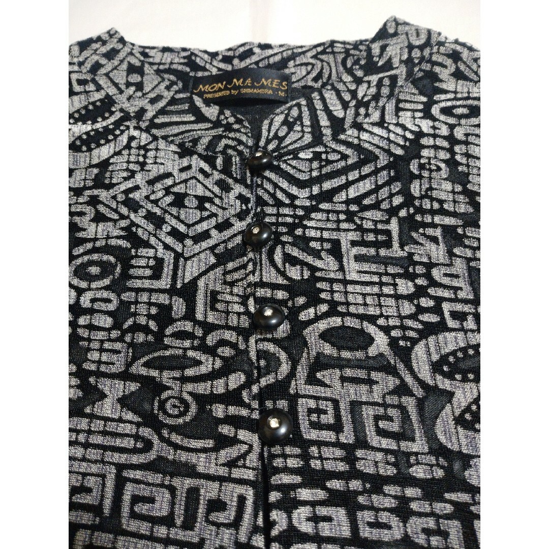 しまむら(シマムラ)の中古品 レディース トップス 総柄 半袖 黒 ブラック系 Tシャツ カットソー メンズのトップス(Tシャツ/カットソー(半袖/袖なし))の商品写真