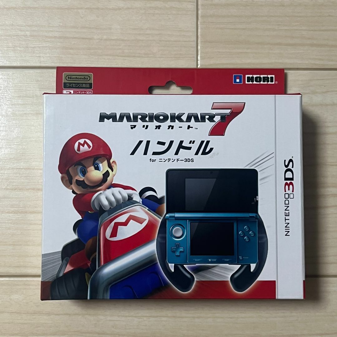 マリオカート7 ハンドル for 3DS 3DS周辺機器 エンタメ/ホビーのゲームソフト/ゲーム機本体(その他)の商品写真