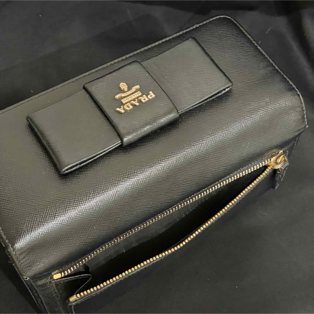 PRADA(プラダ)のプラダ 二つ折り 長財布 サフィアーノ リボン レディースのファッション小物(財布)の商品写真