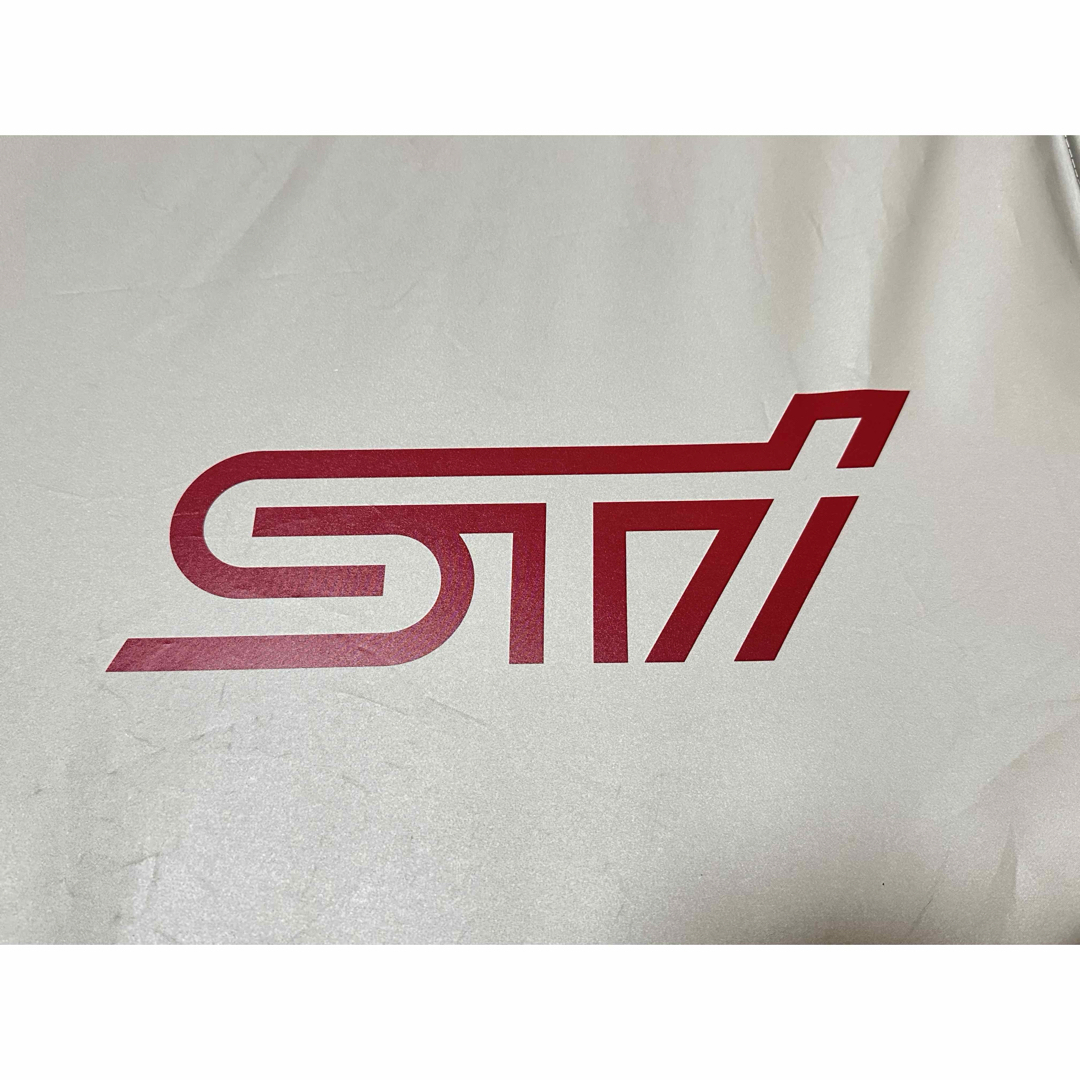 スバル(スバル)のSTI ステアリングカバー付きサンシェード ver.3 自動車/バイクの自動車(車内アクセサリ)の商品写真