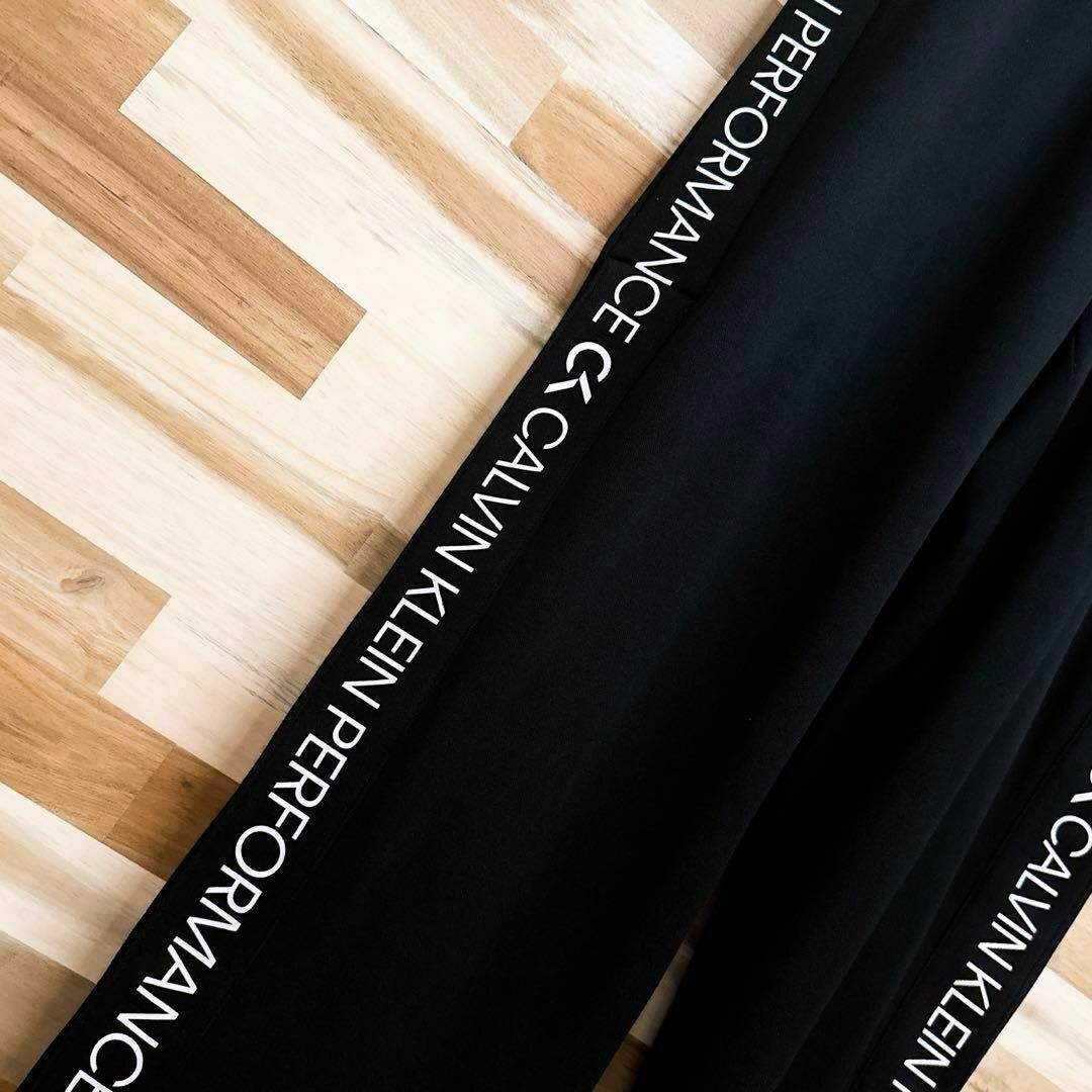 Calvin Klein(カルバンクライン)の【カルバンクライン】ブランド ロゴ サイド バンド トラック パンツ L 黒×白 メンズのパンツ(その他)の商品写真