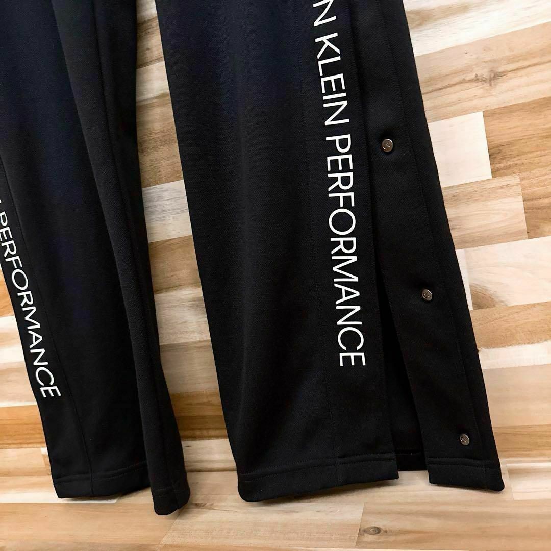 Calvin Klein(カルバンクライン)の【カルバンクライン】ブランド ロゴ サイド バンド トラック パンツ L 黒×白 メンズのパンツ(その他)の商品写真