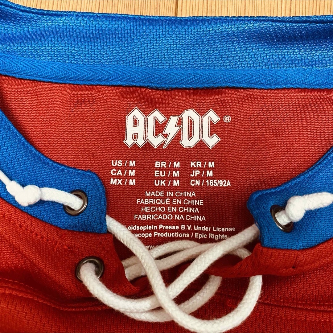 AC/DC メッシュ長袖シャツ Mサイズ レッド メンズのトップス(Tシャツ/カットソー(七分/長袖))の商品写真