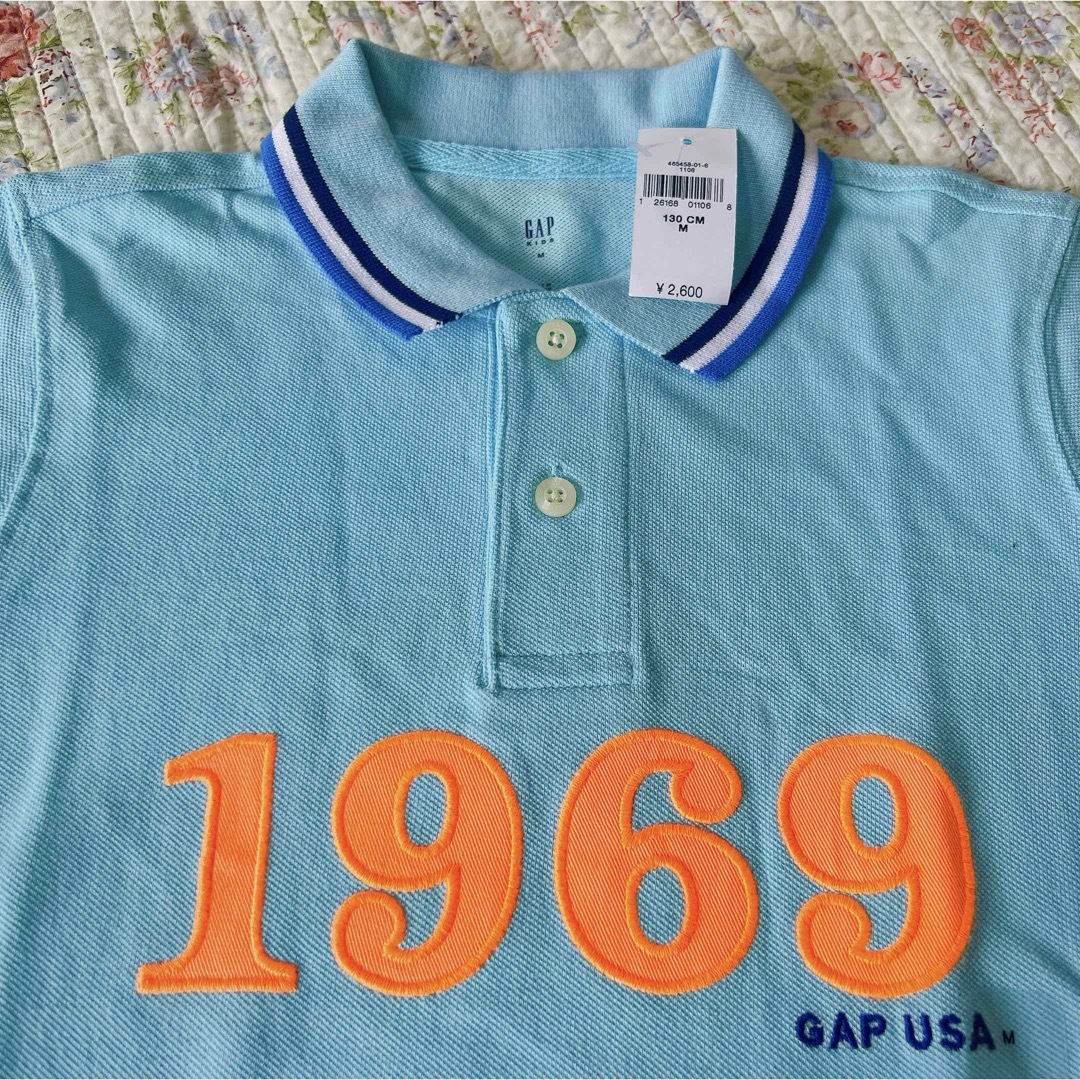 GAP Kids(ギャップキッズ)の【ご専用✨】新品　未使用　タグ付き　Gap kids ポロシャツ　水色　ブルー キッズ/ベビー/マタニティのキッズ服男の子用(90cm~)(Tシャツ/カットソー)の商品写真