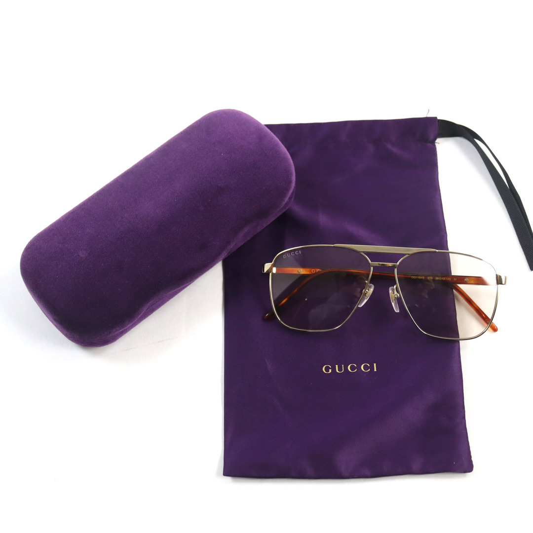 Gucci(グッチ)の未使用品○GUCCI グッチ 691380 ナビゲーターフレーム サングラス 現行品 ロゴ金具付き ツーブリッジ メタルフレーム トータスシェルテンプル サングラス ゴールド ブラウン 58□13-145 保存袋・ケース付き イタリア製 ユニセックス 定価51,700円 レディースのファッション小物(サングラス/メガネ)の商品写真