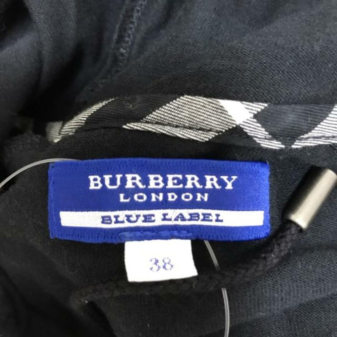 BURBERRY BLUE LABEL(バーバリーブルーレーベル)のBurberry Blue Label(バーバリーブルーレーベル) パーカー サイズ38 M レディース - 黒×白 半袖/ジップアップ レディースのトップス(パーカー)の商品写真