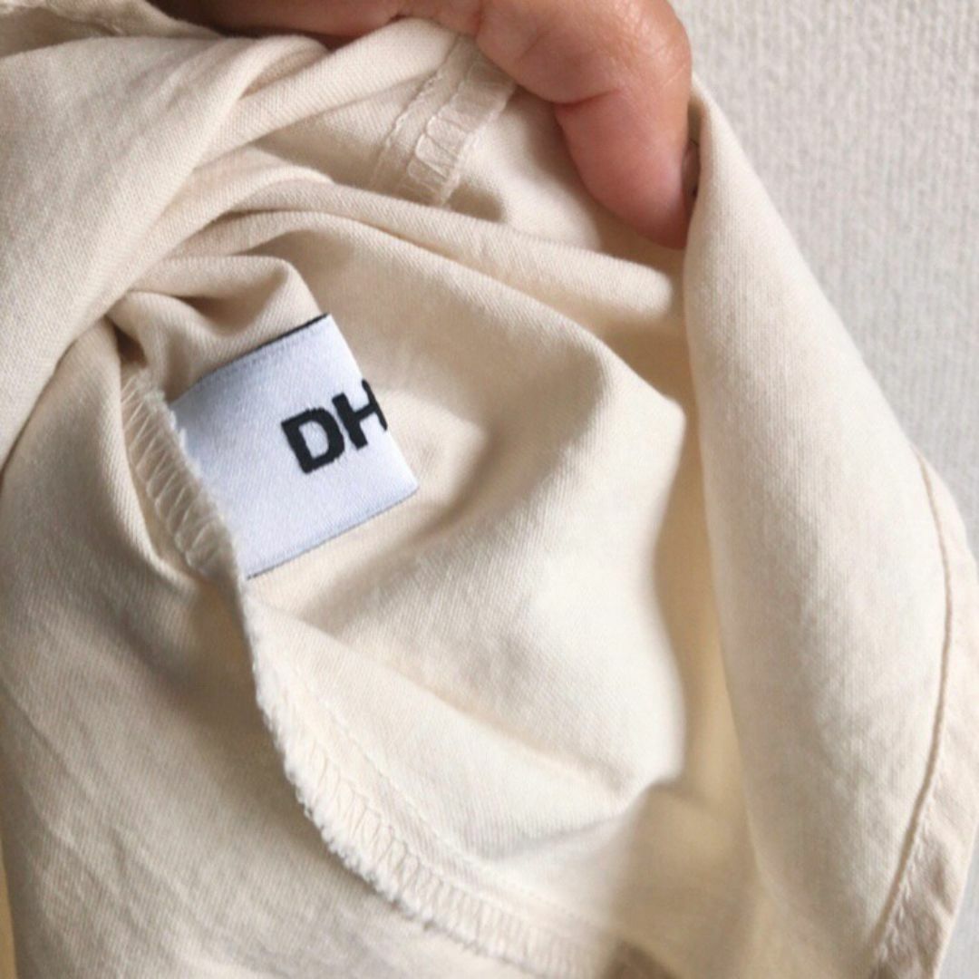 dholic(ディーホリック)のDHOLIC♡ショルダーギャザースリーブレス♡アイボリー♡1回着用ディーホリック レディースのトップス(シャツ/ブラウス(半袖/袖なし))の商品写真