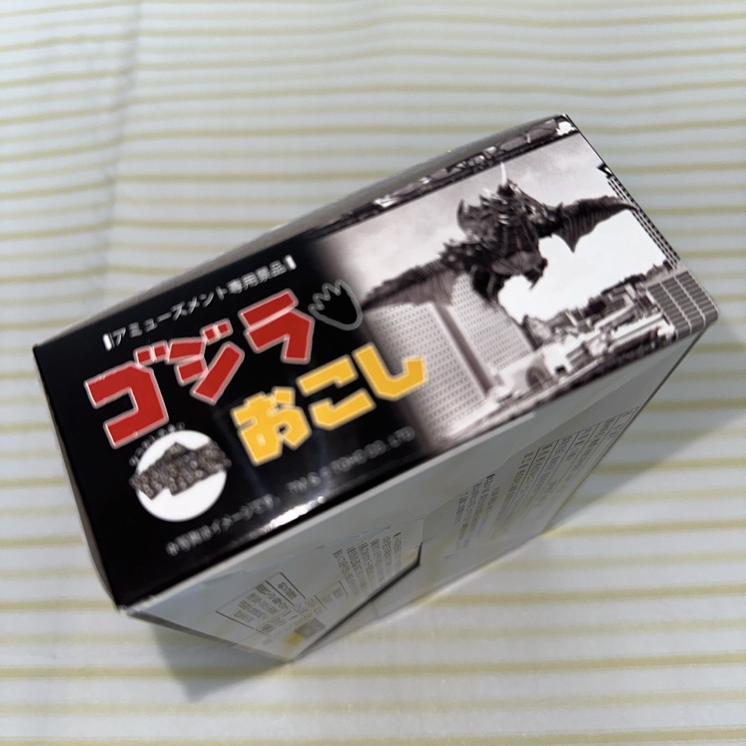 【未開封】アミューズメント景品　ゴジラおこし１箱 食品/飲料/酒の食品(菓子/デザート)の商品写真