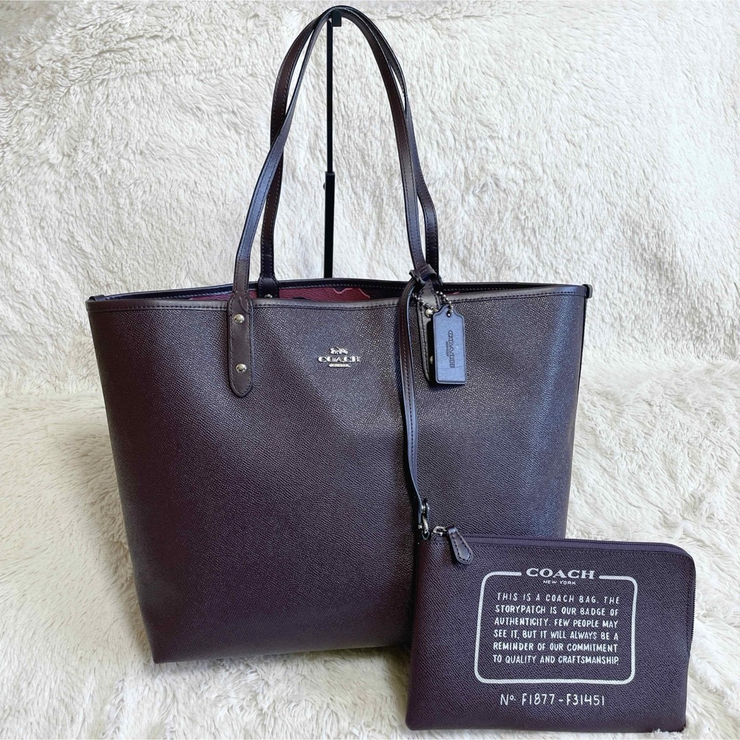 COACH(コーチ)のCOACH リバーシブル カモフラ レザー トートバッグ 船形 ポーチ付 コーチ レディースのバッグ(トートバッグ)の商品写真