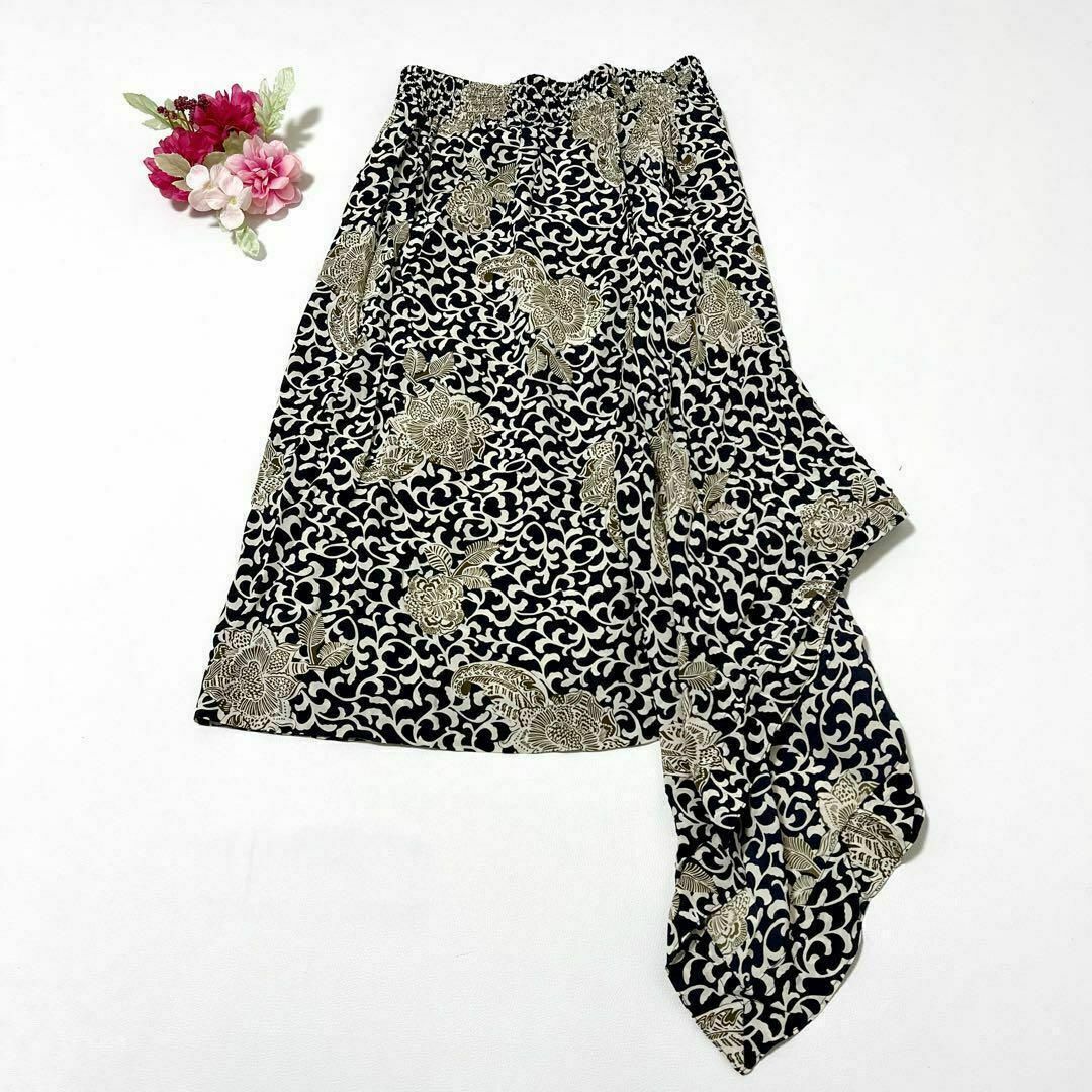 ESCADA(エスカーダ)のESCADA 巻きスカート 2way フリル 総柄 花柄 シルク ブラック 黒 レディースのスカート(ひざ丈スカート)の商品写真