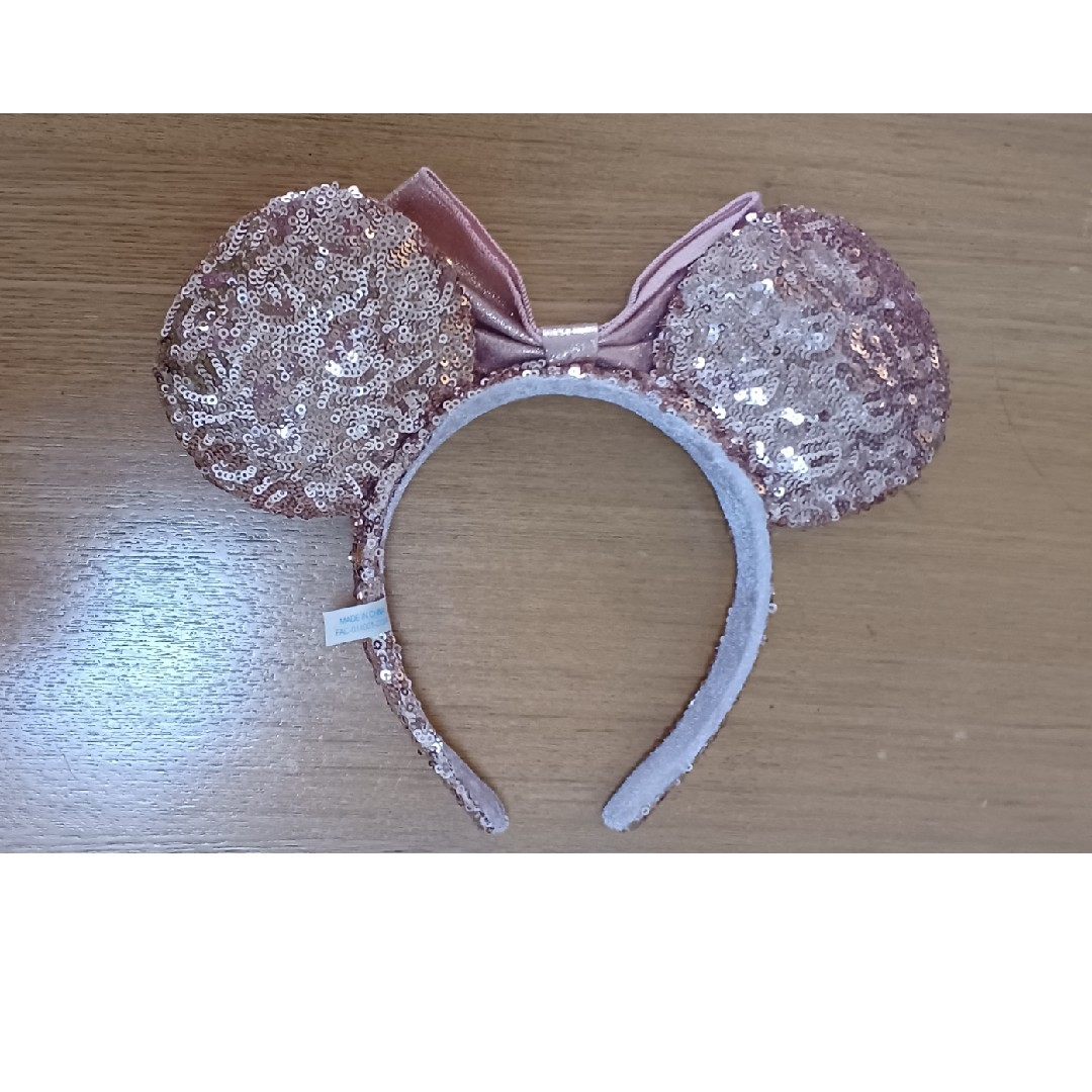 Disney(ディズニー)のディズニー　カチューシャ　ミニーマウス　スパンコール　ピンクゴールド レディースのヘアアクセサリー(カチューシャ)の商品写真