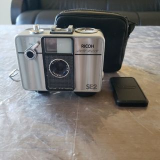 リコー(RICOH)のRICOH  オートハーフ　カメラ　SE2  ケース付き(フィルムカメラ)