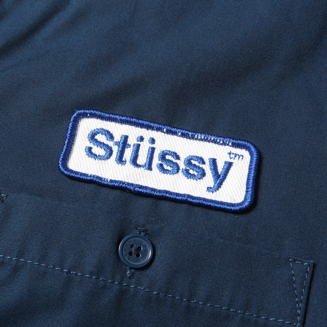 STUSSY(ステューシー)のSTUSSY ステューシー シャツ サイズ:XL パッチ付き T/C ワーク 半袖シャツ ネイビー 紺 トップス カジュアルシャツ【メンズ】【中古】 メンズのトップス(シャツ)の商品写真