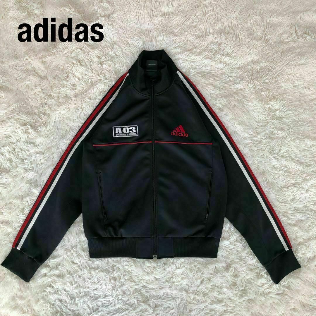 adidas(アディダス)のAdidasアディダス　トラックジャケットA-03ブラック黒赤ジャージ古着L メンズのトップス(ジャージ)の商品写真