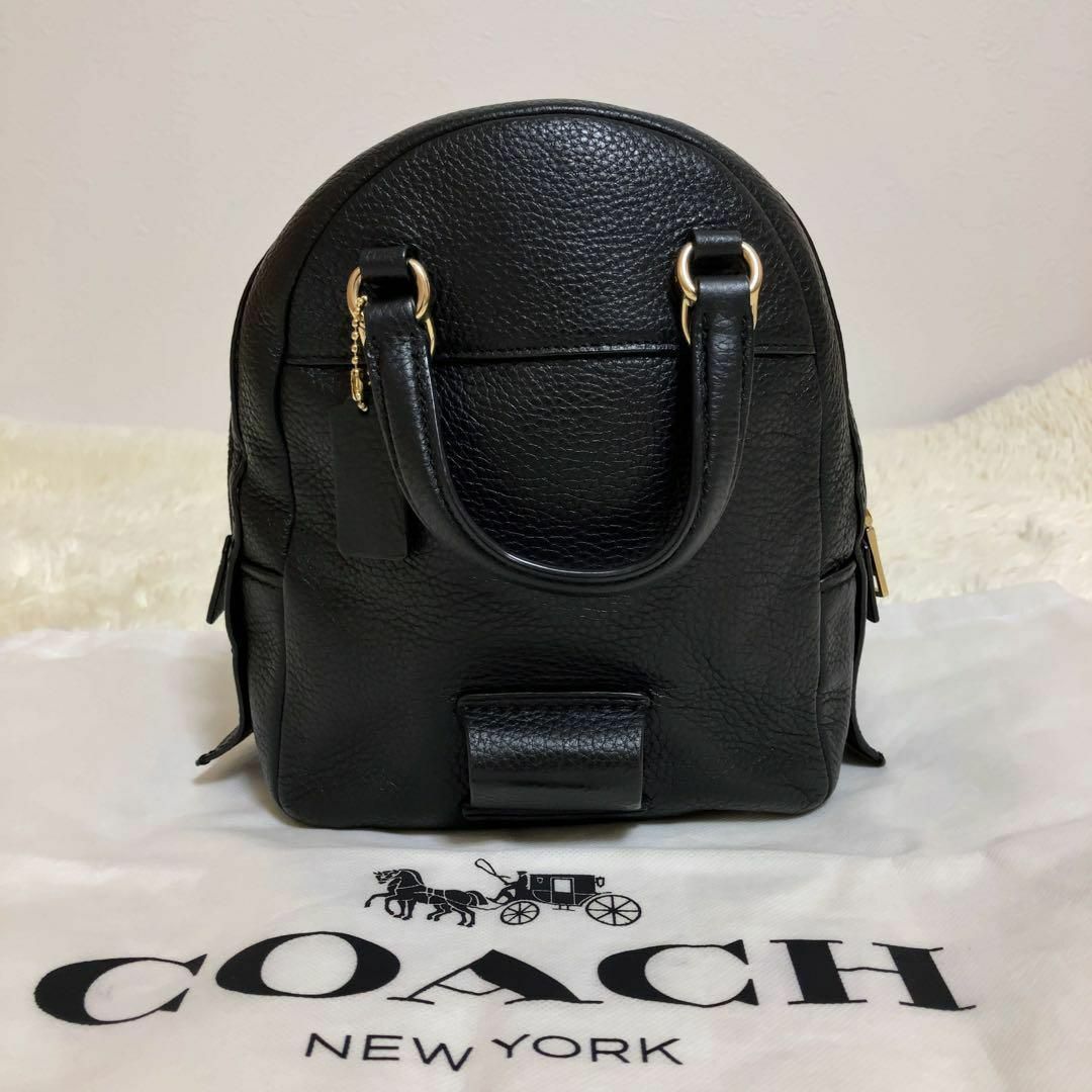 COACH(コーチ)の極美品 コーチ リュック アンディー シボ革 2way レザー チャーム付き 黒 レディースのバッグ(リュック/バックパック)の商品写真