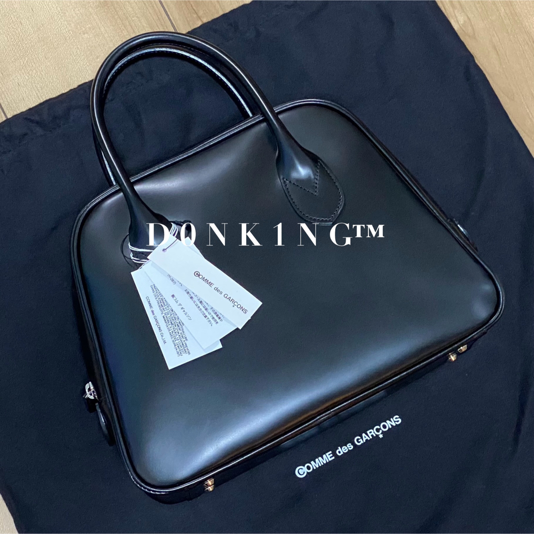 COMME des GARCONS(コムデギャルソン)のコムデギャルソン 青山限定 台形 レザー ステアバッグ 青山バッグ 黒 サイズ3 レディースのバッグ(ハンドバッグ)の商品写真