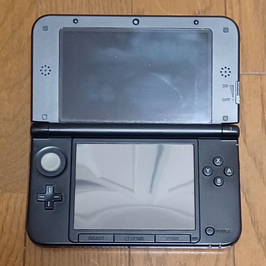 ニンテンドー3DS(ニンテンドー3DS)のニンテンドー3DS LL レッド×ブラック 中古 エンタメ/ホビーのゲームソフト/ゲーム機本体(携帯用ゲーム機本体)の商品写真