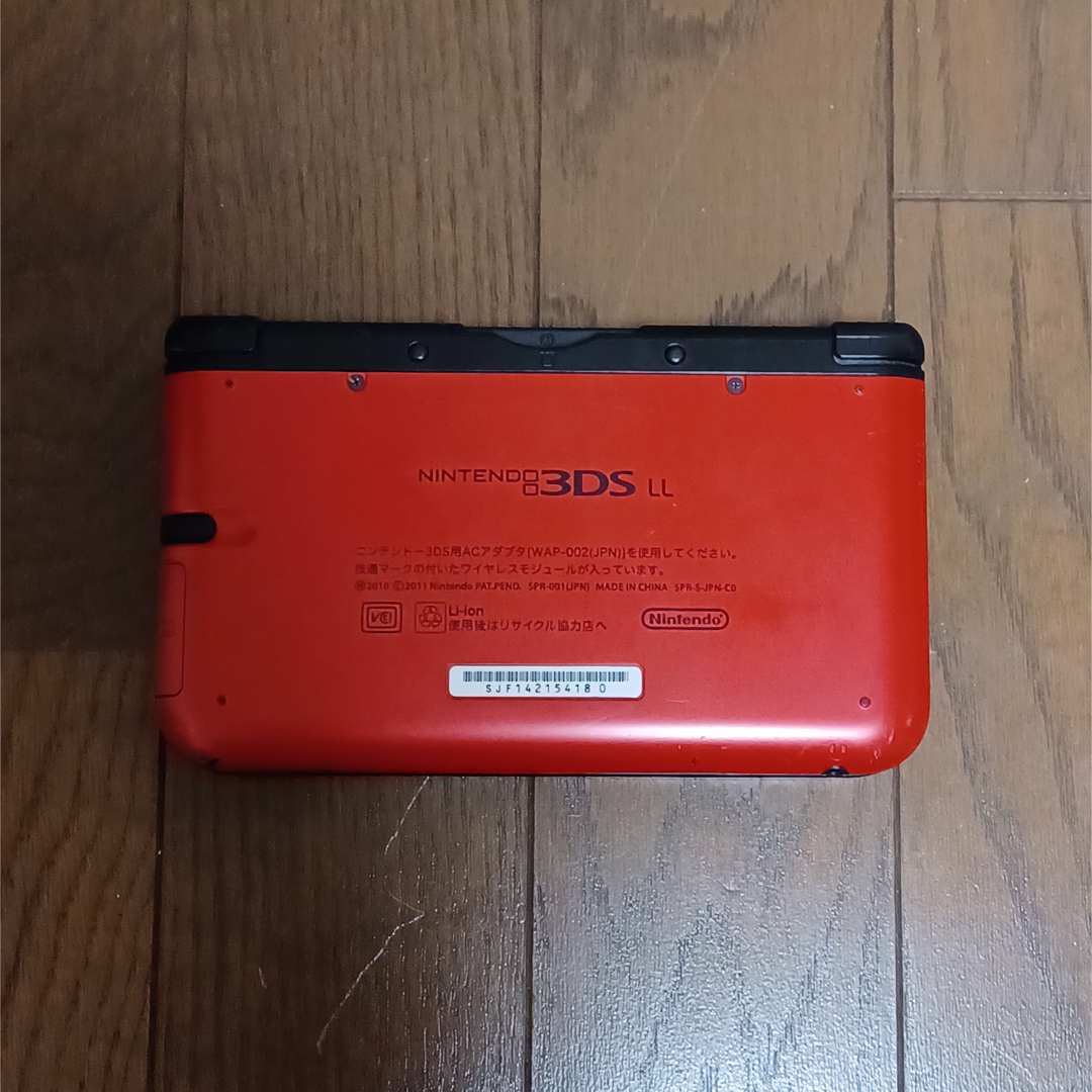 ニンテンドー3DS(ニンテンドー3DS)のニンテンドー3DS LL レッド×ブラック 中古 エンタメ/ホビーのゲームソフト/ゲーム機本体(携帯用ゲーム機本体)の商品写真