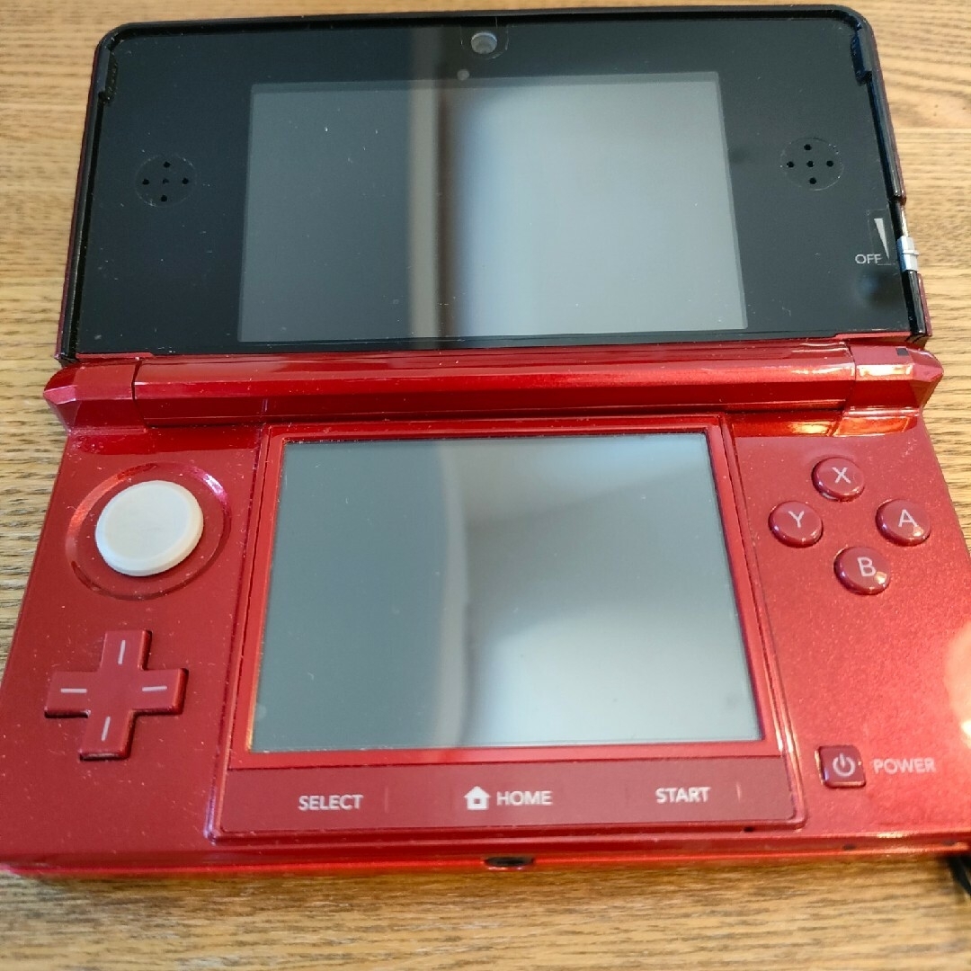 任天堂(ニンテンドウ)の任天堂　3DS　メタリックレッド＋ソフト4本セット エンタメ/ホビーのゲームソフト/ゲーム機本体(携帯用ゲーム機本体)の商品写真