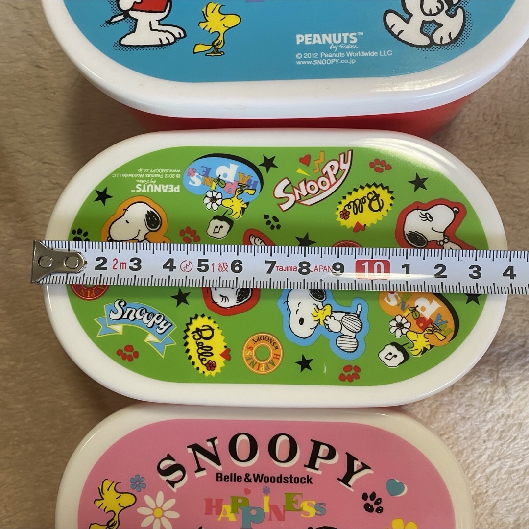 SNOOPY(スヌーピー)の未使用　スヌーピー　お弁当箱　4つ　まとめ売り　重ねられる エンタメ/ホビーのおもちゃ/ぬいぐるみ(キャラクターグッズ)の商品写真