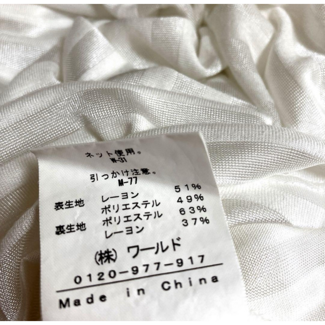 INDIVI(インディヴィ)の美品　INDIVI  インディヴィ　白　ドレープ　カットソー　プルオーバー レディースのトップス(Tシャツ(半袖/袖なし))の商品写真