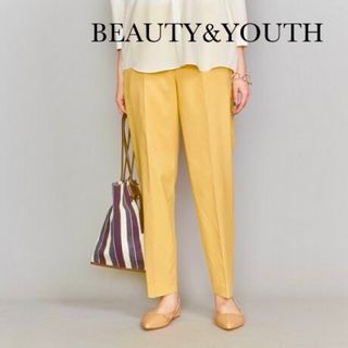 ビューティアンドユースユナイテッドアローズ(BEAUTY&YOUTH UNITED ARROWS)のBEAUTY&YOUTH「カルゼタックテーパードパンツ」イエロー　Sサイズ(カジュアルパンツ)