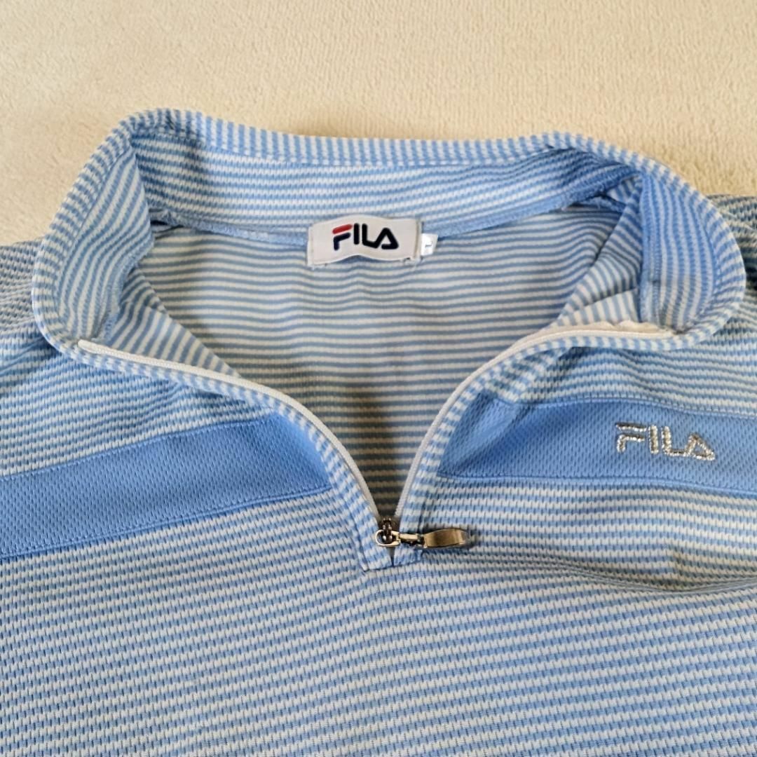 FILA(フィラ)の【FILA】ゴルフウェア　シャツ　半袖　ハーフジップ　L　青　ワンポイント刺繡 スポーツ/アウトドアのゴルフ(ウエア)の商品写真